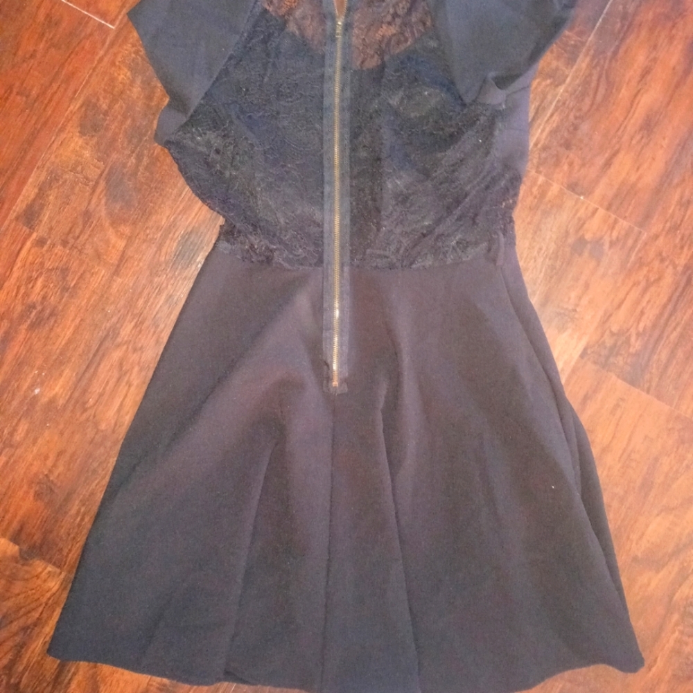 Monteau dress with lace accents on back and by hips